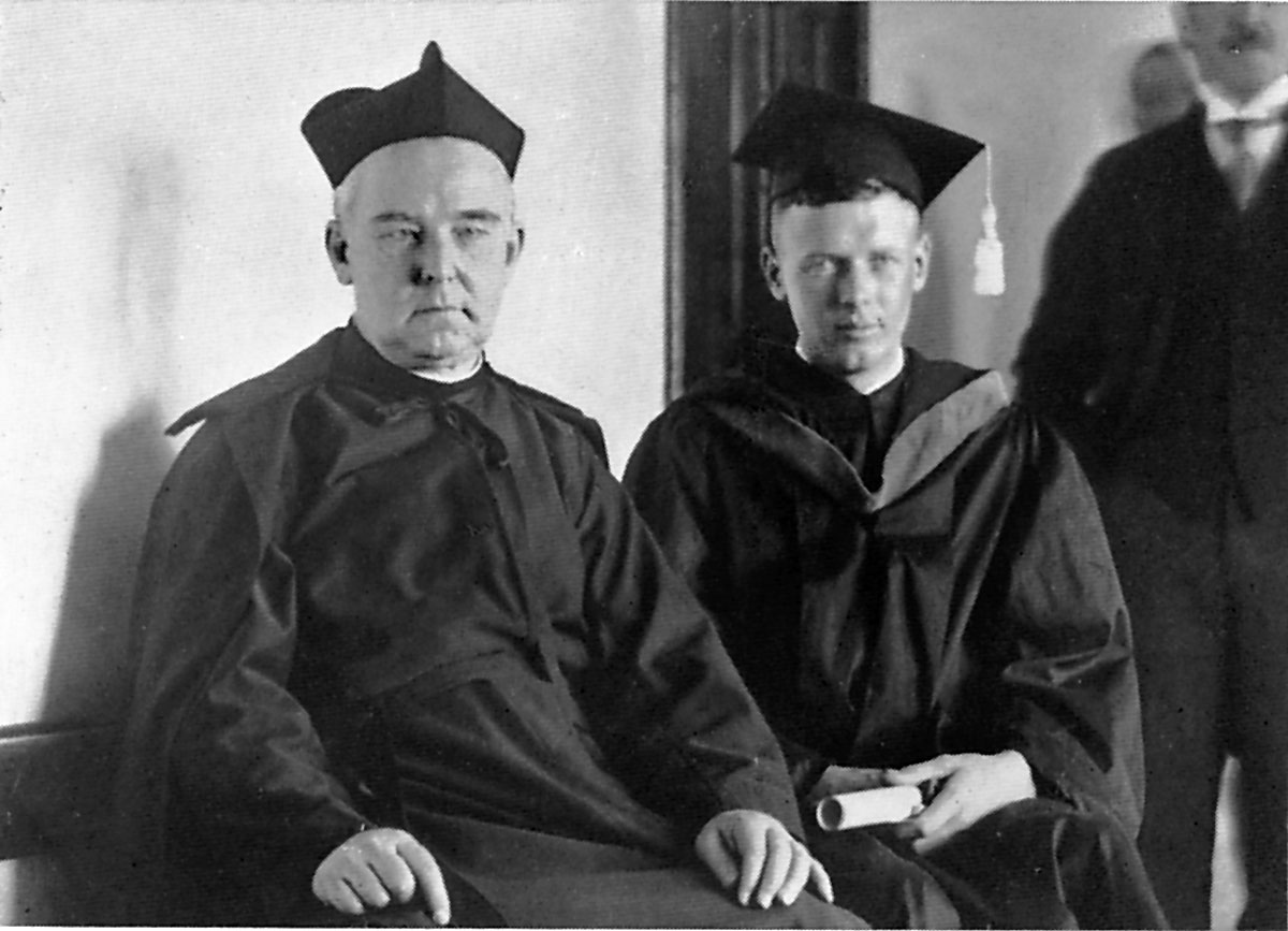 Lindbergh with Albert G. Brown, S.J. in cap and gown in conjunction with ceremony and dedication of Barbelin Hall on  November 13, 1927